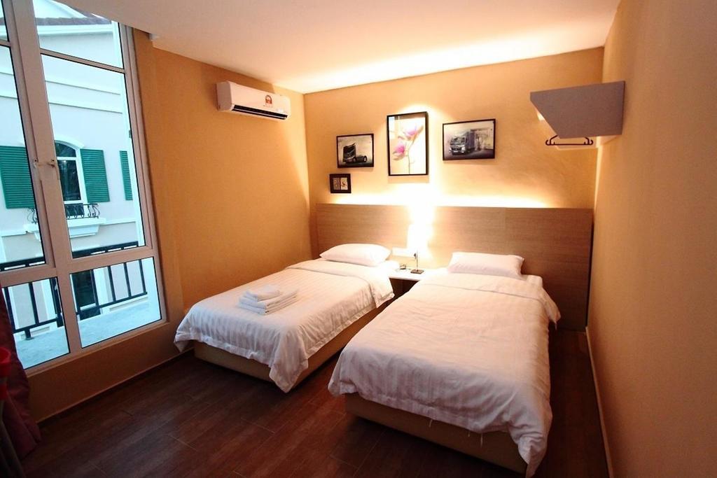 91 Street Boutique Inn Miri Oda fotoğraf
